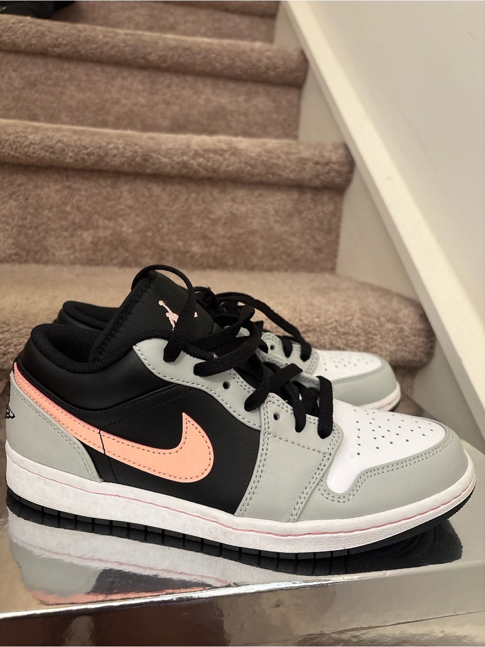 Nike Air Jordan 1 men’s Low-Top Sneakers in Black, Gray & Coral